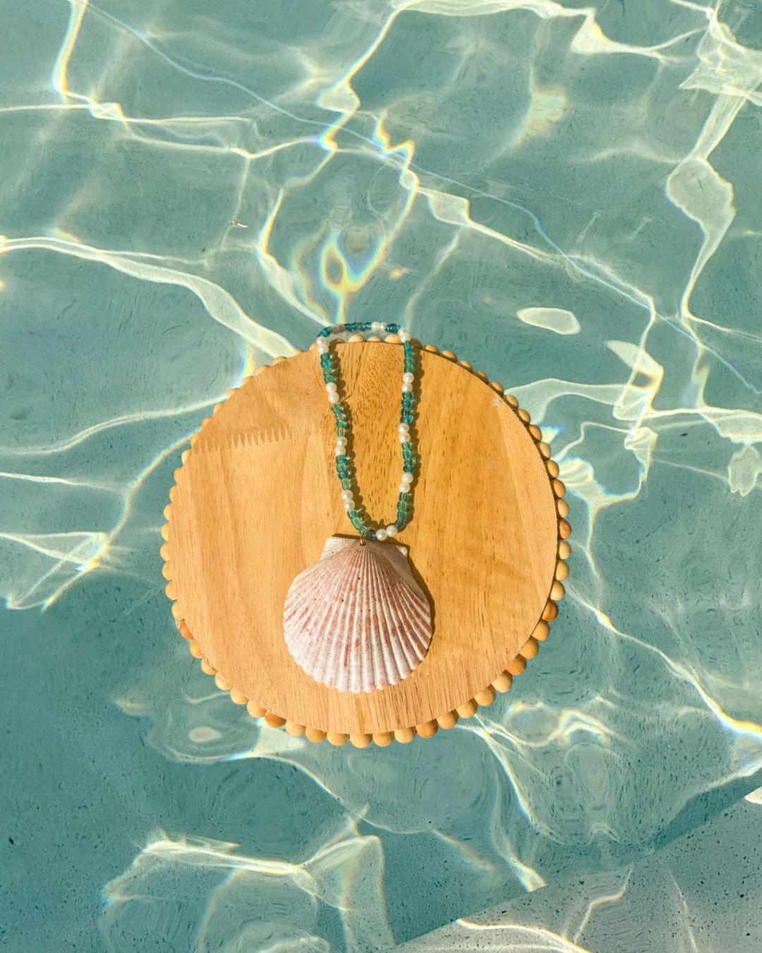 Review Mirror Shell Charm