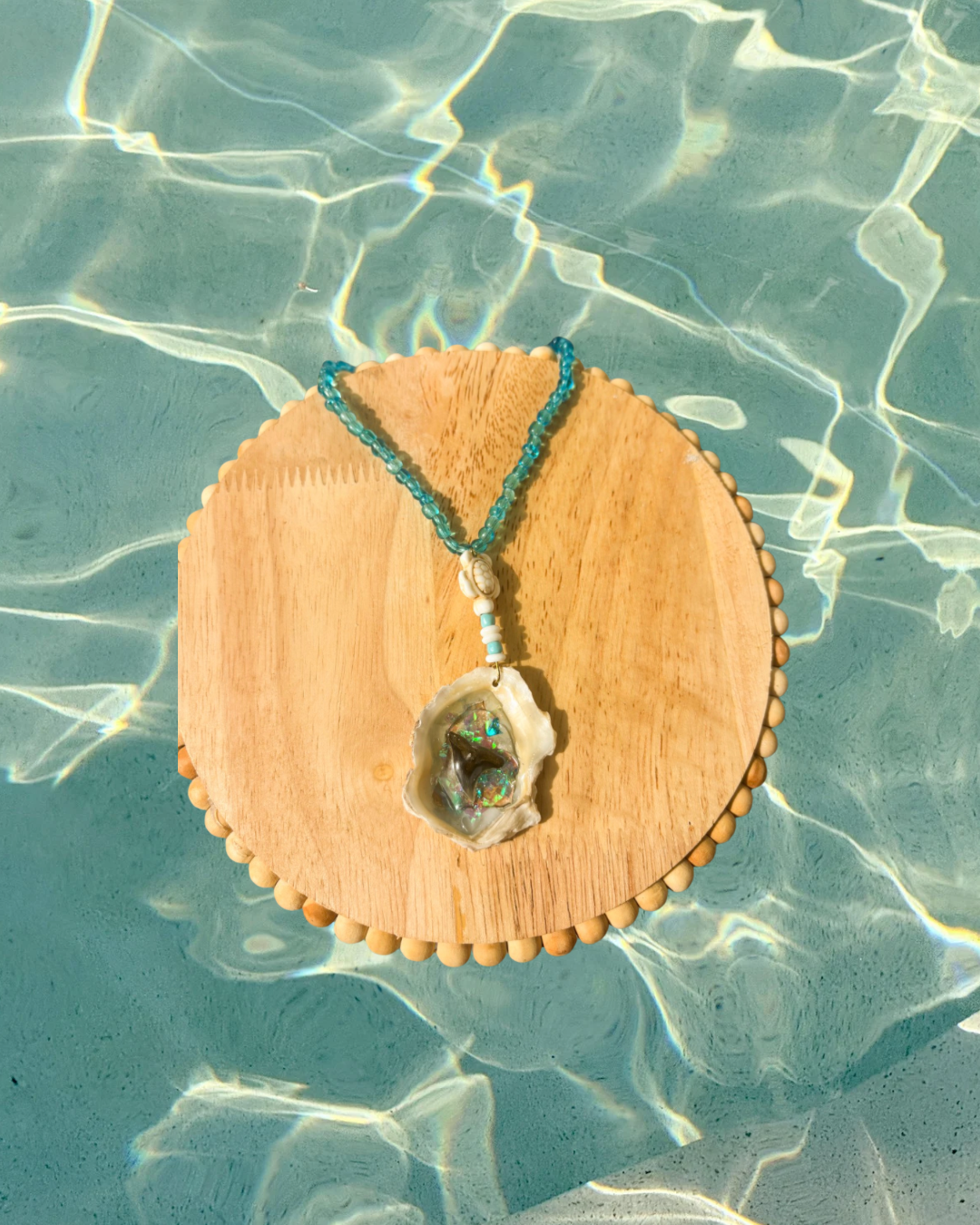 Review Mirror Shell Charm
