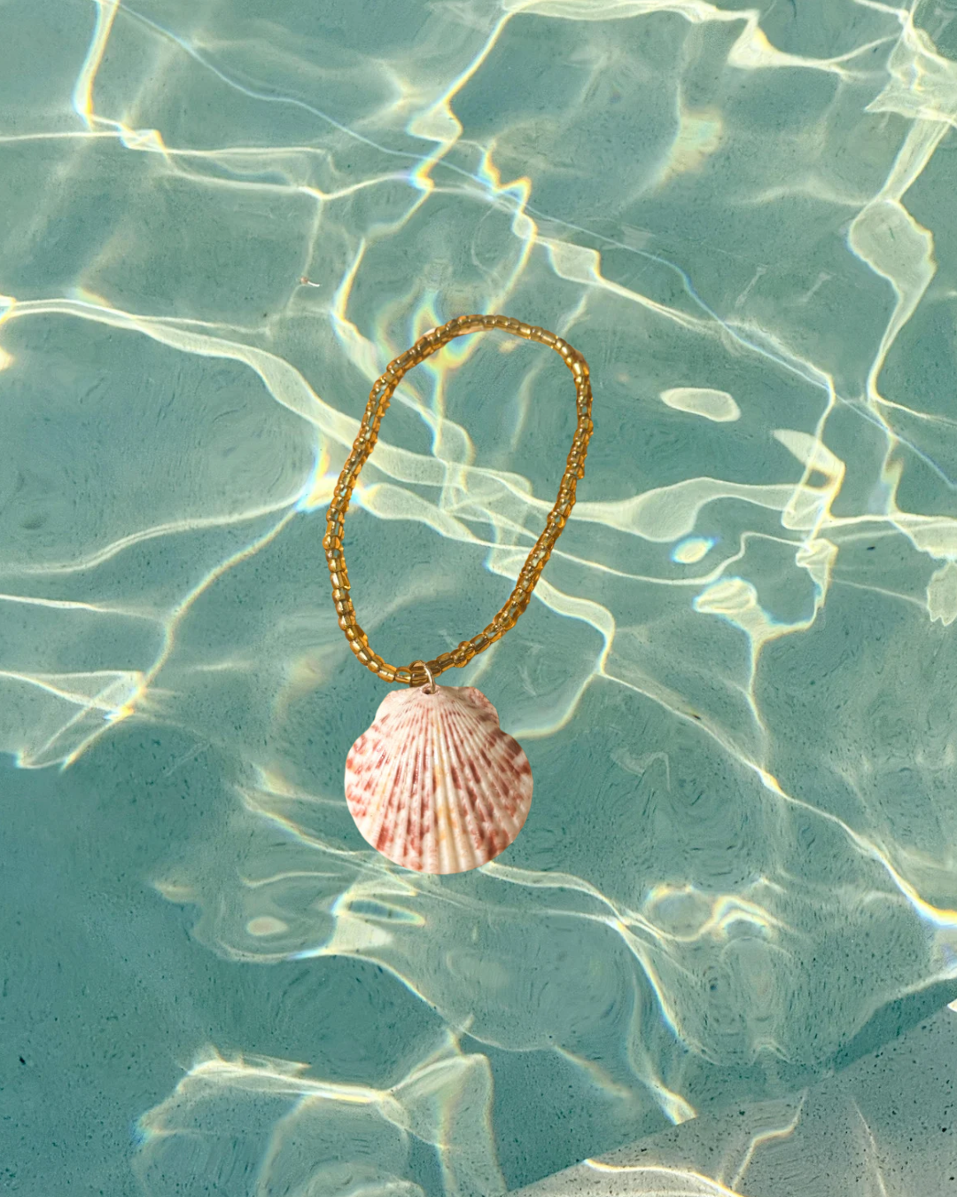 Review Mirror Shell Charm