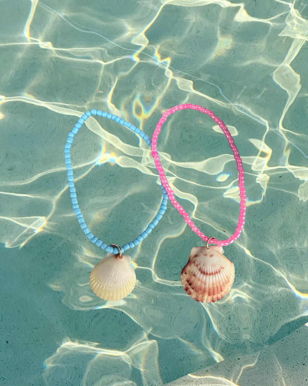 Review Mirror Shell Charm