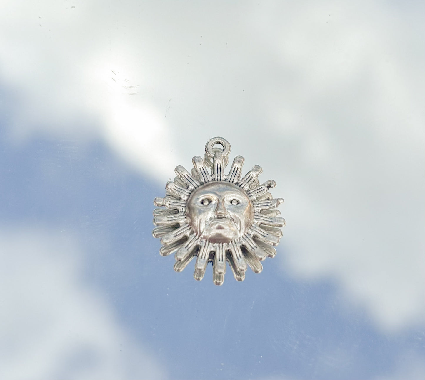 Sun charm Silver