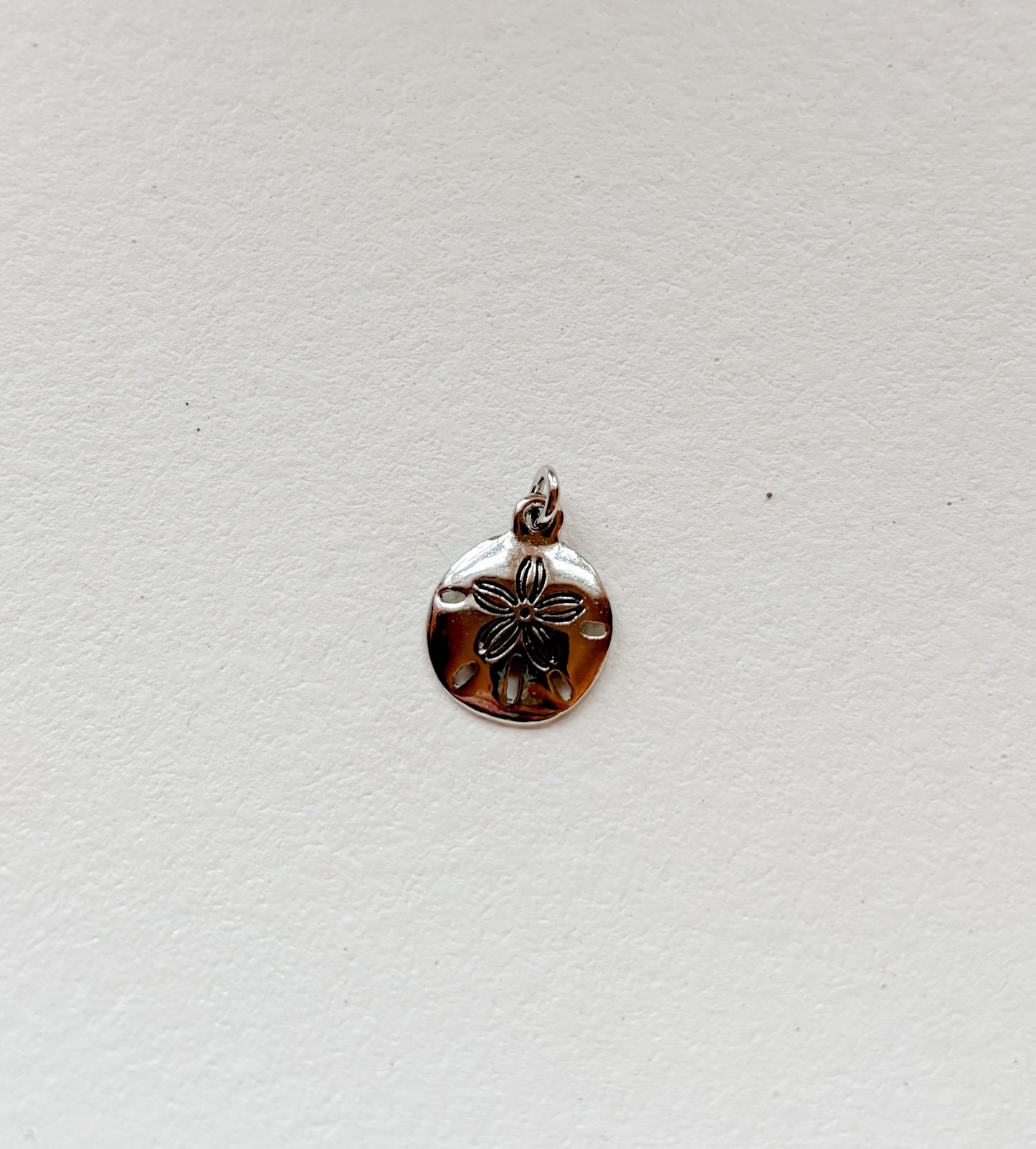 Sand dollar charm